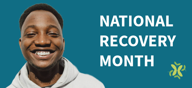 Smiling person next to text 'NATIONAL RECOVERY MONTH' on blue background