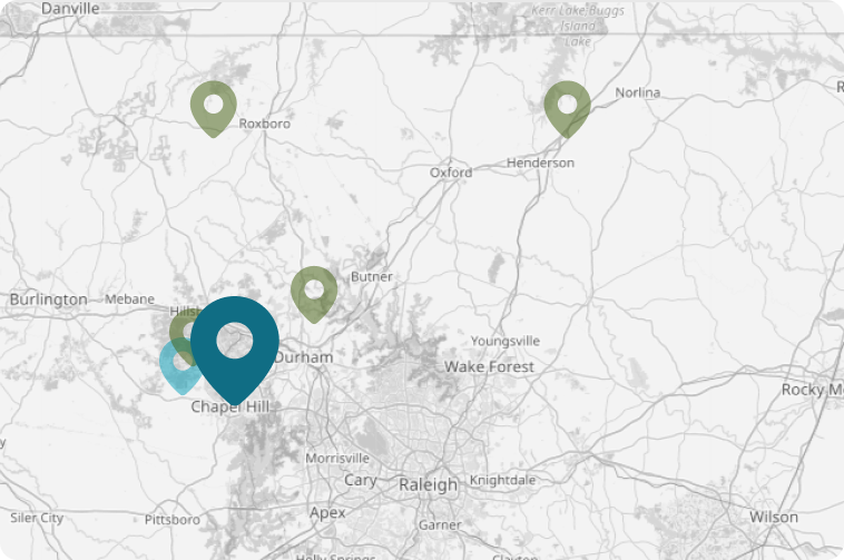 Map showing multiple location markers around Chapel Hill and Durham area
