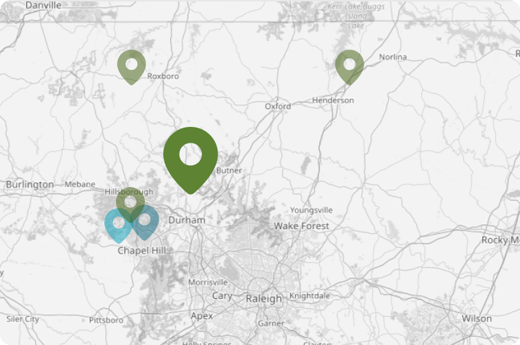 Map showing multiple location markers clustered around Durham area